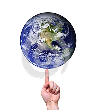 Hand balancing earth on fingertip photo