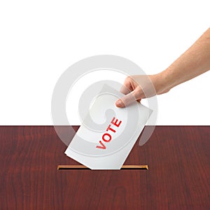 Hand with ballot and box