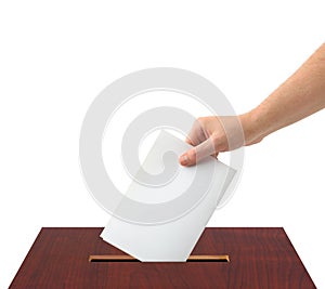 Hand with ballot and box