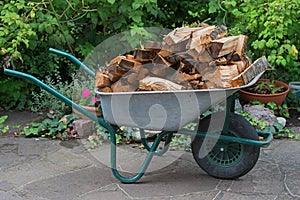 Hand barrow with splitted firewood