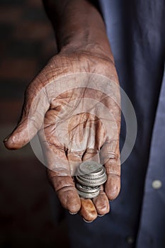 A hand begging for more money