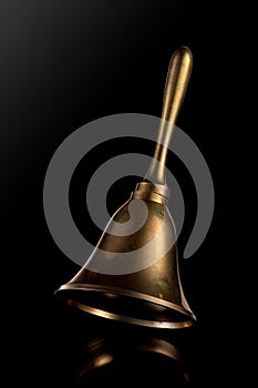 Hand Bell isolated on a black background
