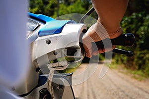 Hand of Bikers driving a motorcycle