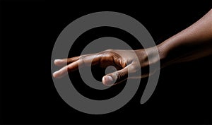 hand on a black background .feelings shown by hands