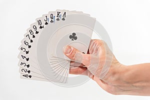 hand with black decks of fan card
