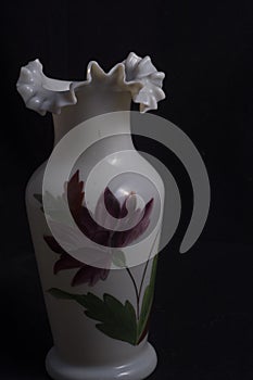 Blown glass vase with floral pattern photo