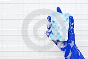Hand in blue glove