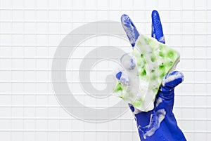 Hand in blue glove