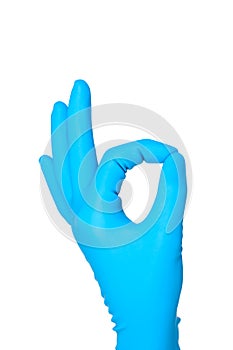 Hand in blue glove OK sign isolated