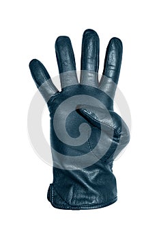 A hand in a blue leather glove makes a gesture with four fingers up.