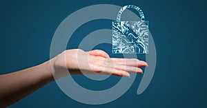Hand with blue lock graphic over palm against blue background