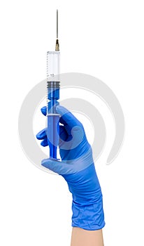 Hand with blue syringe