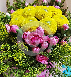 Hand bouquete with colorfull flowers. photo