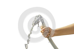 Hand boy holding the rubber tube and the water flows out on a white background with clipping path