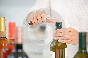 hand broaching bottles wine