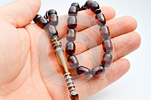 Hand and brown beads sequenced, short rosary, tespih tesbih