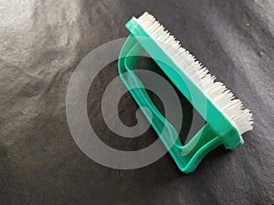 Hand brush to clean dirty clothes.