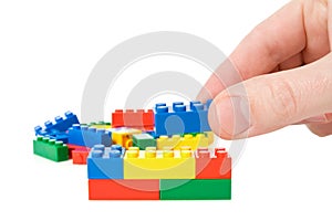 Hand build a color plastic bricks