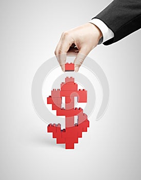 Hand building dollar