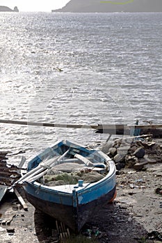 Hand built native fishing boat on shore bequia