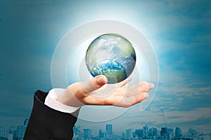 Hand of Business Man hold earth globe