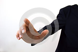 Hand business man pushing on a touch screen interface