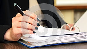 Hand of business woman with document viewer
