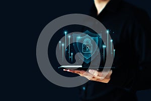 Hand of businessman holding tablet and shield protect icon