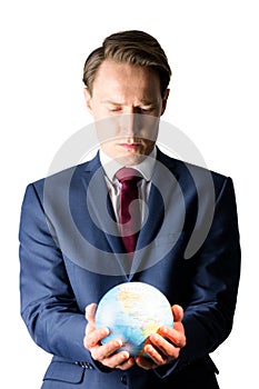 Hand of businessman holding terrestrial globe