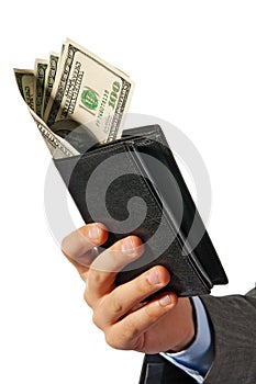 Hand of the businessman holds a purse with money