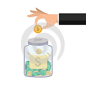 Hand  businessman putting coin in jar