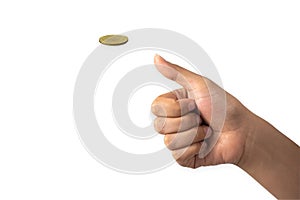 Hand of businessman tossing a golden coin on white back