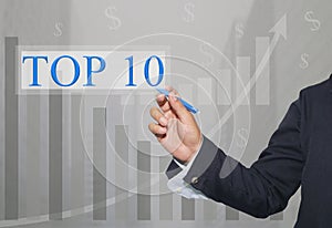 Hand of businessman Write a text of TOP10.