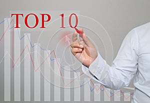 Hand of businessman Write a text of TOP10.
