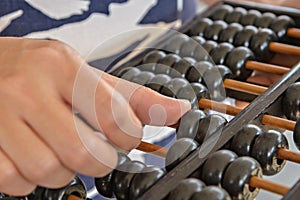 Hand calculated on Old abacus