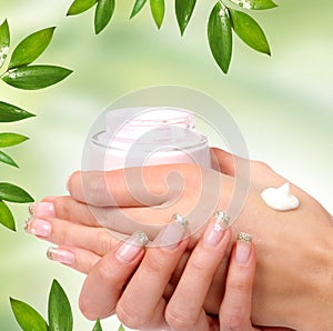 Hand care on green photo