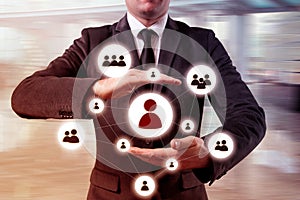 Hand carrying businessman icon network - HR,HRM,MLM, teamwork and leadership concept