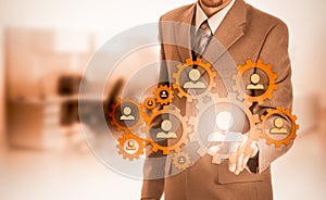 Hand carrying businessman icon network - HR,HRM,MLM, teamwork and leadership concept