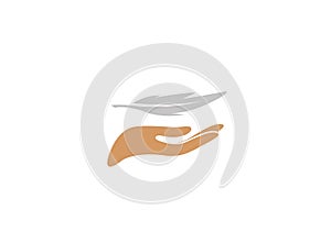 Hand carrying a quill or plume for logo design