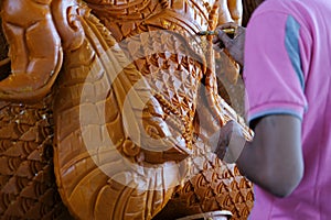 Hand carving candle for decoration in buddhist festival