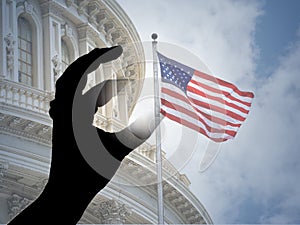 Hand catching american flag on capitol hill congress washington dc
