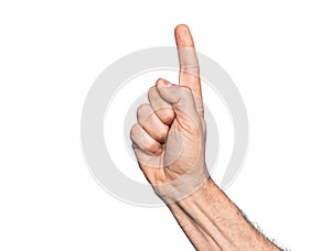 Hand of caucasian middle age man over isolated white background counting number one using index finger, showing idea and