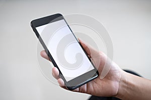 Hand of caucasian woman hold mobile phone