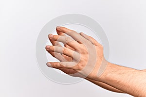 Hand of caucasian young man showing fingers over isolated white background touching fingertips, concentration and business