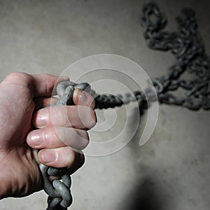 Hand on chain