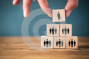 Organization and team structure symbolized with cubes photo