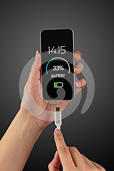 Hand charging phone with low battery