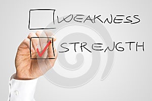 Hand Checking Box Next to the Word Strength