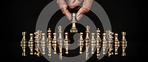 Hand choose king chess piece concepts of fighting challenge of leader business team or teamwork wining and leadership strategic