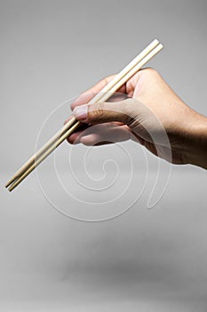 Hand chopstick sticking together